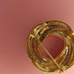 Vintage Monet gold tone double circle brooch