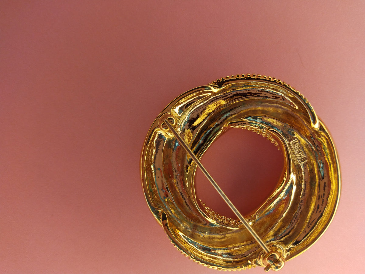Vintage Monet gold tone double circle brooch