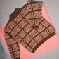 Brown flecked sweater with white geometric pattern
