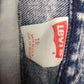 High-waisted acid wash Levi 900 series