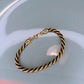 Vintage Trifari gold tone and black bracelet