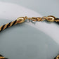 Vintage Trifari gold tone and black bracelet