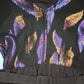 Vintage 1980s cocktail dress with purple and gold iridescent feathers